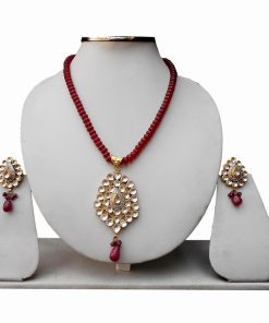 Buy Pendant Set for Women in Red and White Antique Polish Kundan Stones-0