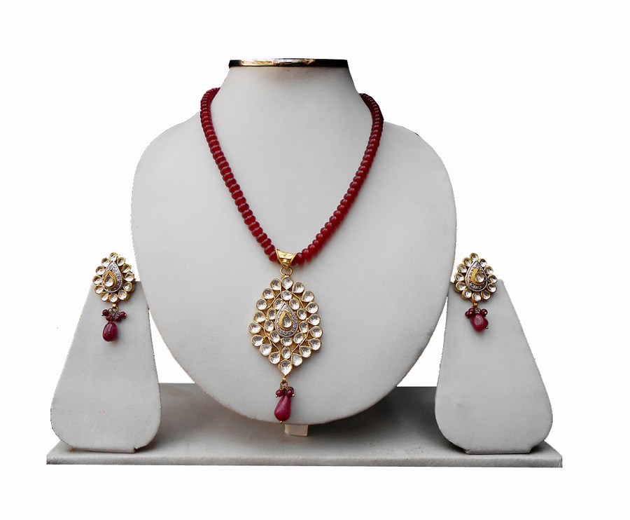 Buy Pendant Set for Women in Red and White Antique Polish Kundan Stones-0