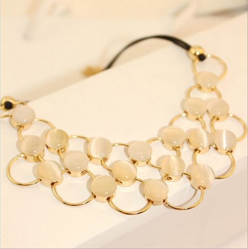 Beach Partyr Necklace in Golden Rings and Off-White Stone Arrangement-0